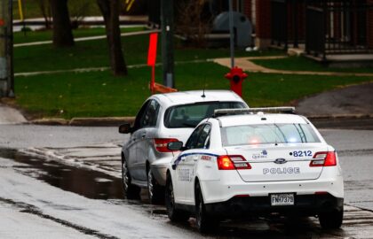 A police car stop a vehicle.