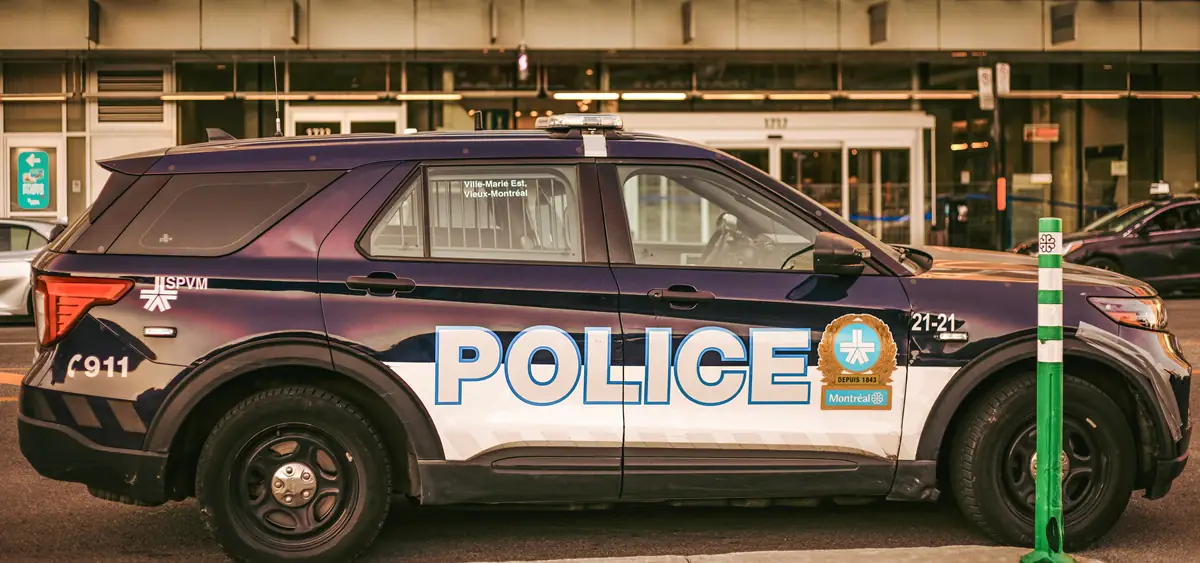 A police car is parked in Montreal.