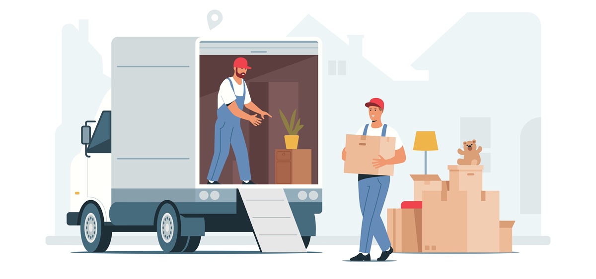 Vous avez des recours si votre entreprise de déménagement cause des dégâts. Deux personnes chargent des boîtes en carton dans un camion devant une maison.